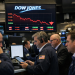 Top stocks dragging the Dow Jones Index as it moves into a correction
