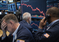 Dow Jones falls 253 points as Iran tensions, earnings weigh mood