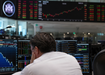 London’s FTSE 100 dips as utilities and miners drag index