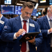 Dow dips as S&P 500, Nasdaq hit records amid oil surge fears