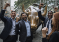Dow Jones slips while S&P 500 hits record high on AI chip rally