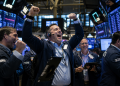 Dow reverses early losses as US-Iran deal hopes lifts markets