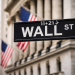 Dow ends 50 points higher as Nasdaq slides on inflation, chip selloff