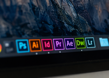 Why is Adobe stock sliding today despite earnings beat?
