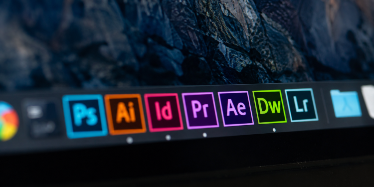 Why is Adobe stock sliding today despite earnings beat?