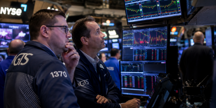 Dow hits record high as AI rally offsets US-Iran tensions on Wall Street