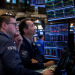 Dow hits record high as AI rally offsets US-Iran tensions on Wall Street