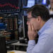 UK equities hover at three-week lows as investors assess global risks
