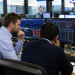 UK stocks edge higher as mining and financial shares lift FTSE 100