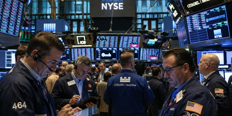 Dow edges higher as Intel slips despite earnings, Nasdaq dips