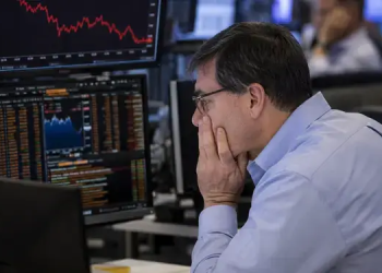 Dow slips as Hormuz uncertainty, Intel share sale weigh on Wall Street
