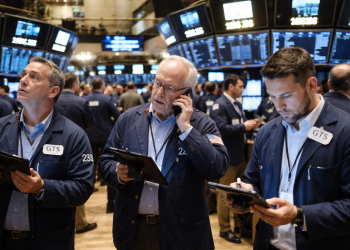 Dow slips as Nasdaq jumps after weak jobs data cools Fed rate hike bets