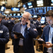 Dow slips as Nasdaq jumps after weak jobs data cools Fed rate hike bets