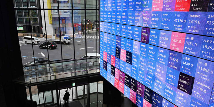 Why Japanese stocks rose as government bond yields and the yen fell after rate hike